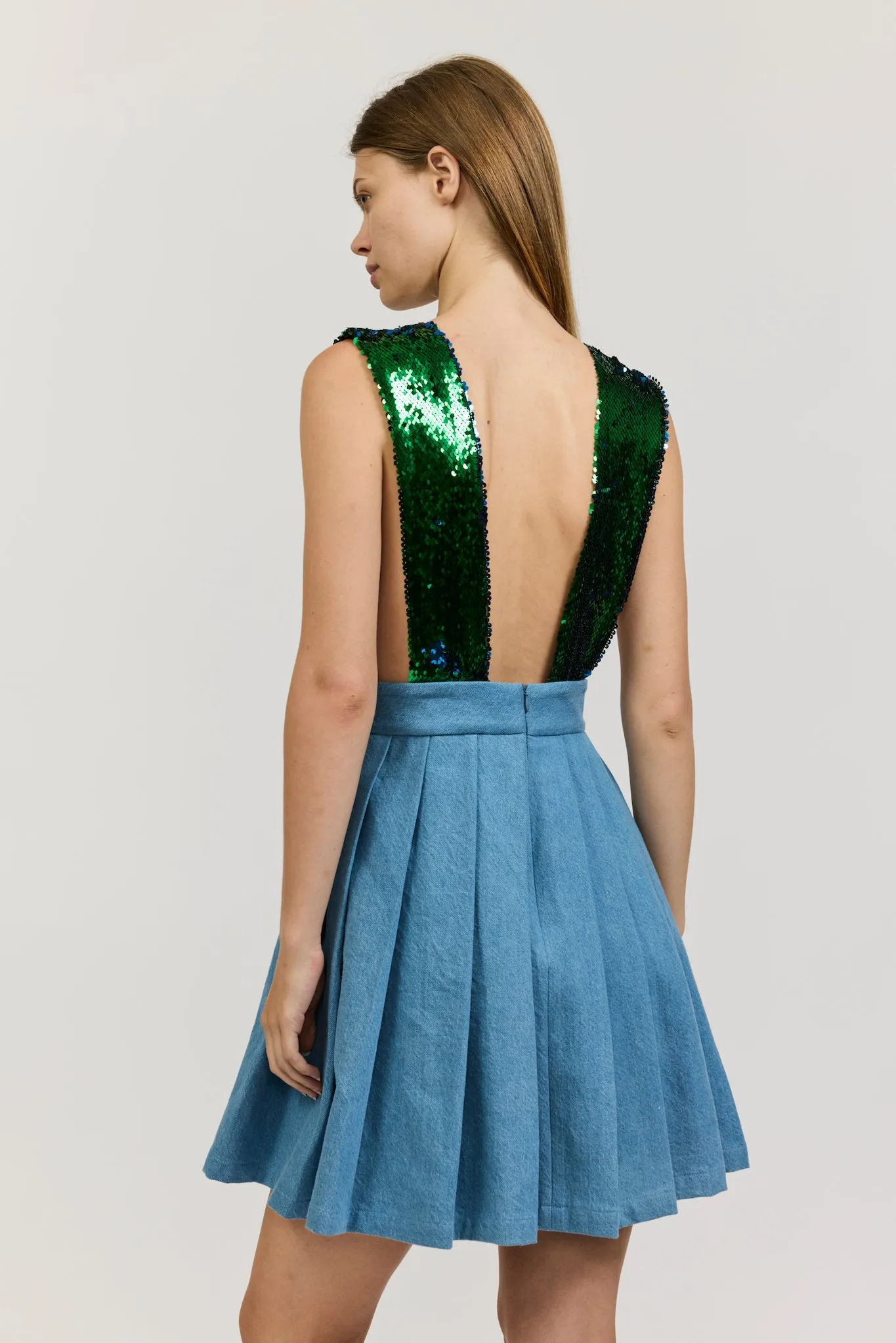 Pleated Mini Apron Dress in Denim with Green Sequins